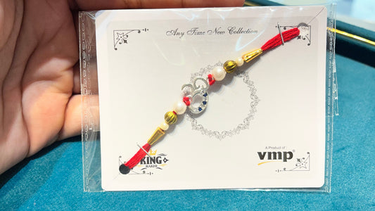 Om Silver Rakhi – A Timeless Bond of Love & Protection